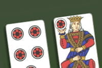 Zwei altmodische Spielkarten.