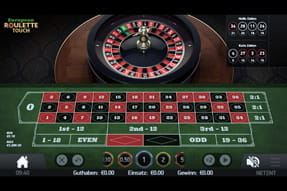 Das Bild zeigt einen Roulette Tisch.