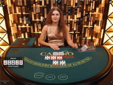 Das Bild zeigt einen Dealer an einem Pokertisch.