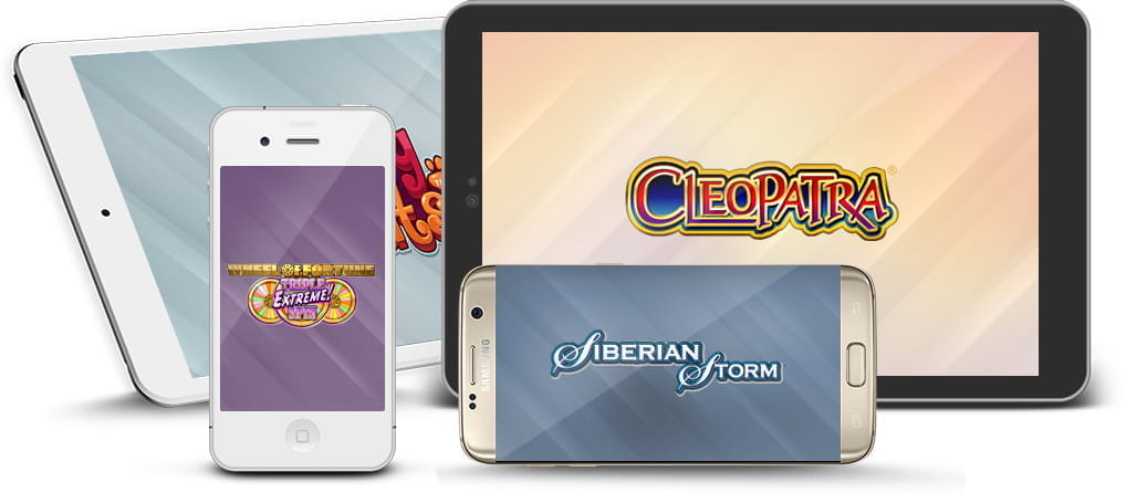 Eine Auswahl der IGT Spielen zeigen die Bildschirme des Smartphones und Tablets.
