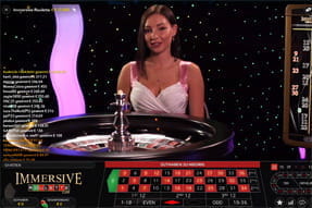 Das Bild zeigt eine Dealerin am Immersive Roulette Tisch.